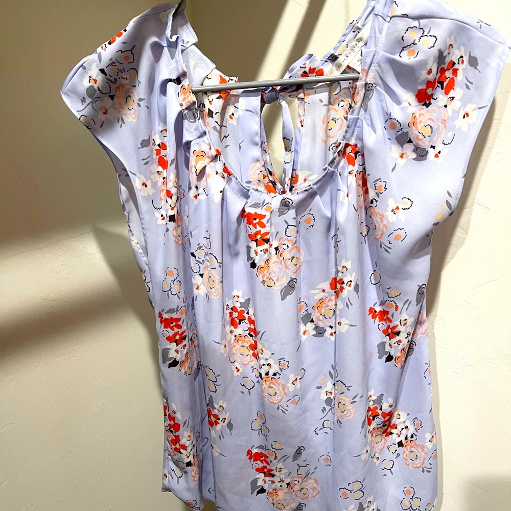 Purple floral blouse